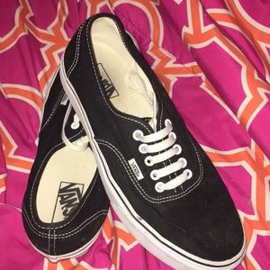 Van’s size 10 1/2 men’s black sneakers.